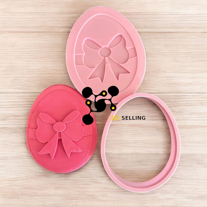 Selling 3D Casa, arredamento e bricolage:Articoli per cucina e bar:Accessori per pasticceria:Altro accessori per pasticceria Uovo con fiocco tagliabiscotti in 3D