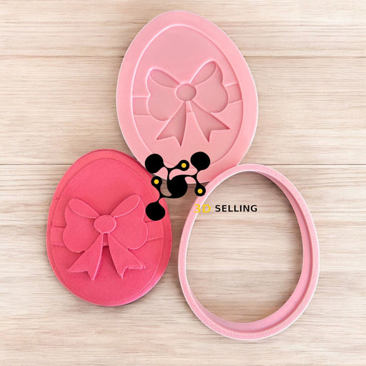 Selling 3D Casa, arredamento e bricolage:Articoli per cucina e bar:Accessori per pasticceria:Altro accessori per pasticceria Uovo con fiocco tagliabiscotti in 3D